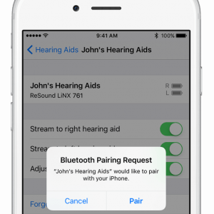 iPhone cuya pantalla lee un menú de sincronización con audífonos.